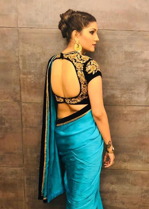 5 stunning pics of Sapna Chaudhary in backless sarees. - SpideyPostsBlog