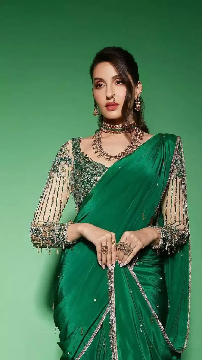 nora fatehi full sleeves blouse saree